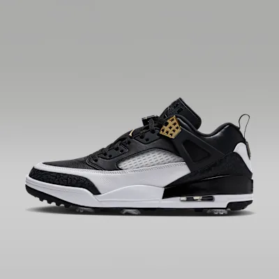 Side view of the black and white Jordan Spizike G golf shoe with gold details